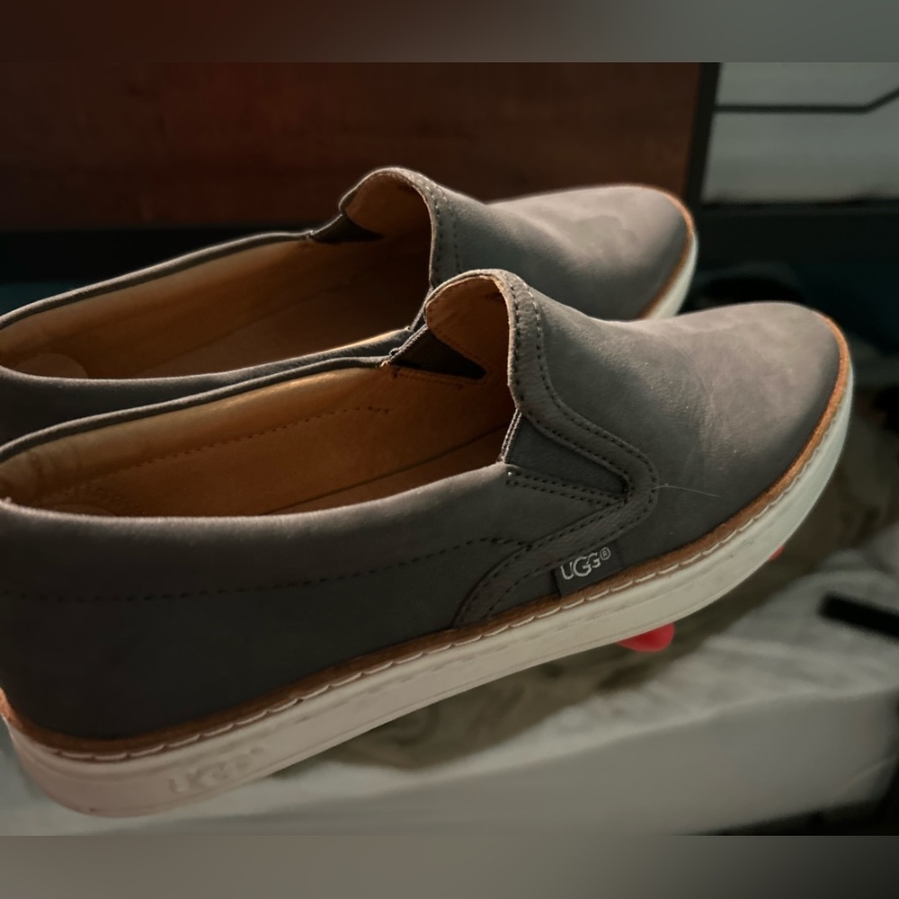 UGGs woman’s slip on suede shoes.